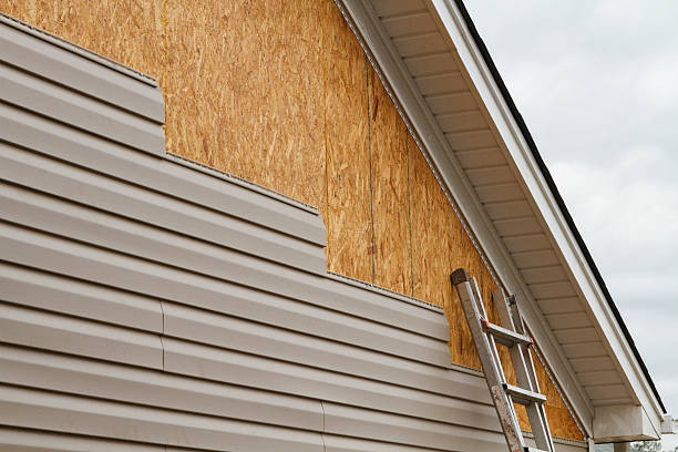 Professional Vinyl Siding technician working in Red Lion, PA